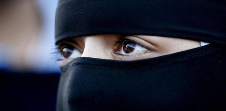 In the United States, a 7-year-old Muslim girl was forced to take off her niqab by a teacher